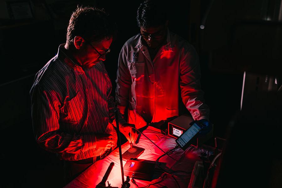 Jonathan Celli and Shakir Khan in the lab