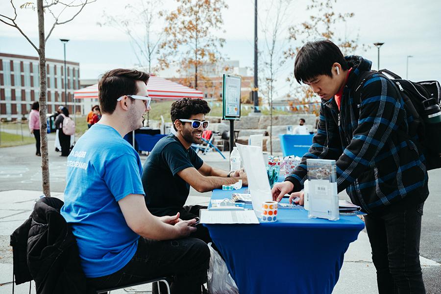 Student at table at Beacon Wellness Walk Resource Fair